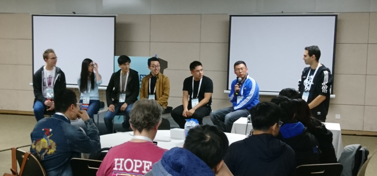 Picture of contributor panel at 2018 Shanghai contributor summit.  Photo by Josh Berkus, licensed CC-BY 4.0